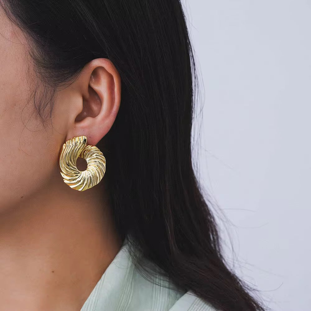 Asymmetric statement earrings